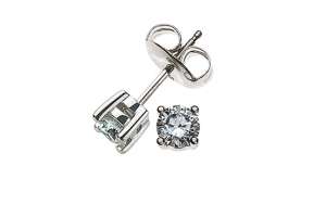 Clous d´oreilles solitaires 4-griffes or gris 750 0.26 ct. avec